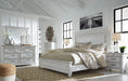 Kanwyn King Panel Bed with Mirrored Dresser, Chest and Nightstand